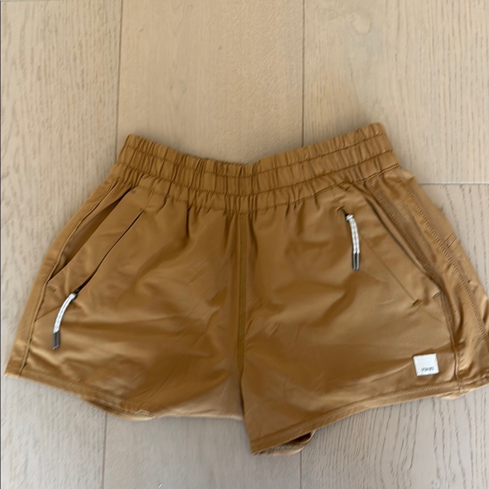 Vuori Women's Athletic Shorts in Tan